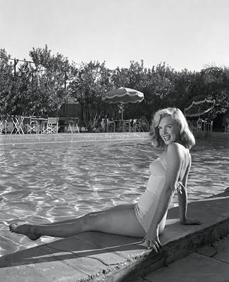 Marilyn Monroe at The Racquet Club pool in Palm Springs CA